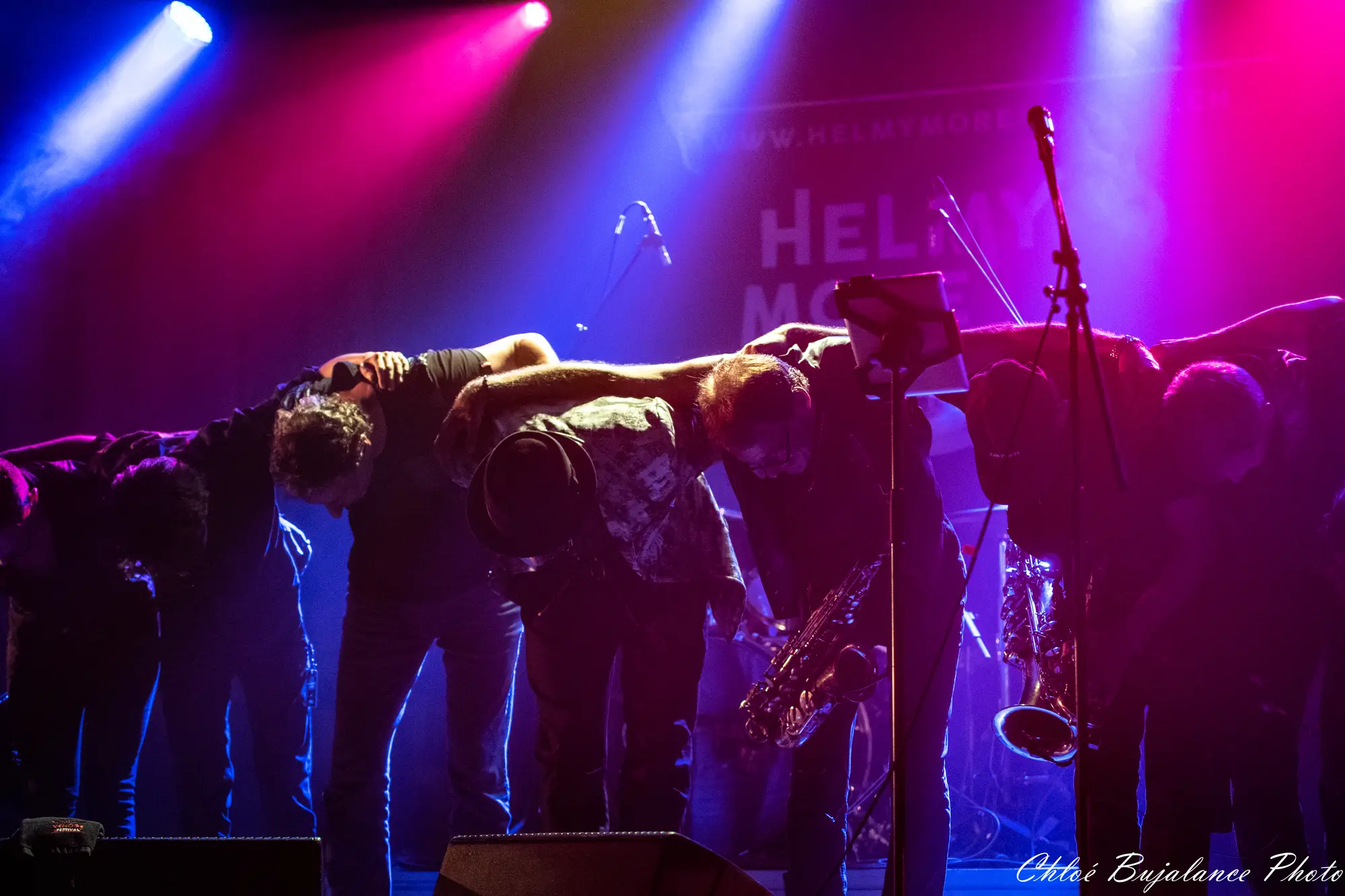 Helmy More Funker's musicians bowing on stage